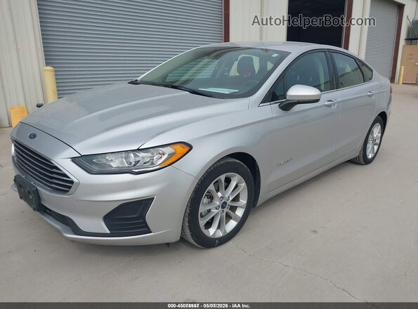 3FA6P0LU7KR190831 2019 FORD FUSION HYBRID Silver Առջևի ձախ երեք քառորդ տեսարան