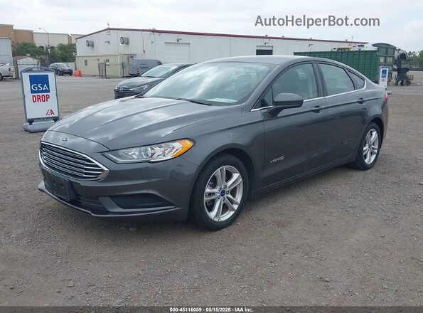 3FA6P0UU7JR235750 2018 FORD FUSION HYBRID Gray Vista tres cuartos delantera izquierda
