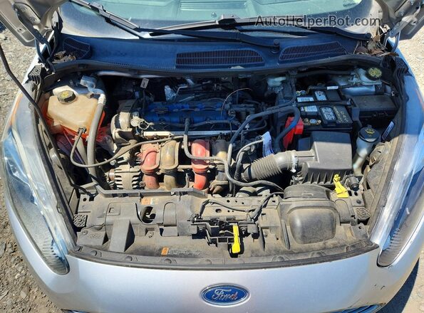 3FADP4AJXKM129462 2019 FORD FIESTA Silver Vista interior trasera