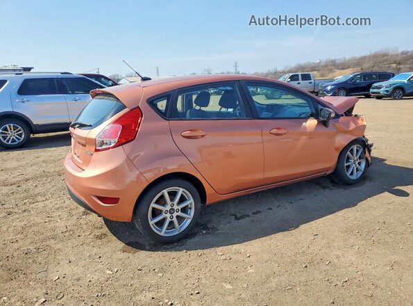3FADP4EJ7HM102240 2017 FORD FIESTA Оранжевый Задняя правая четверть