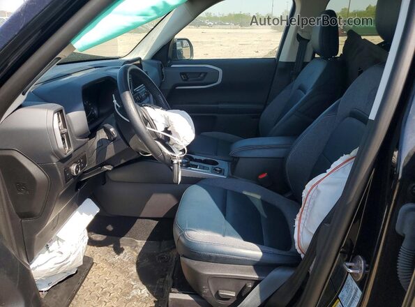 3FMCR9C65PRD50978 2023 FORD BRONCO Черный Вид салона спереди