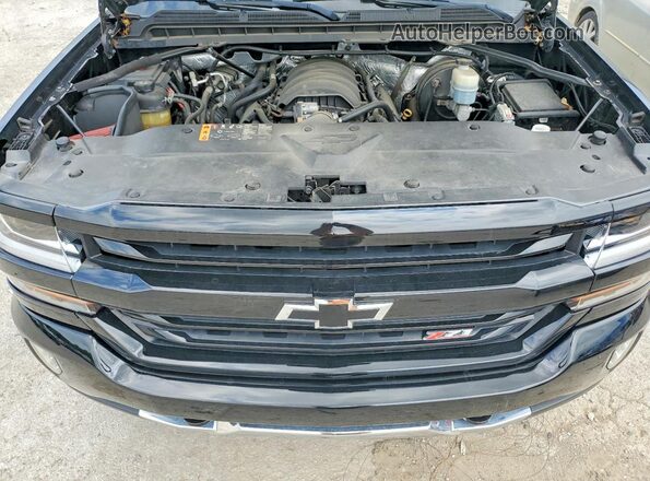 3GCUKREC0JG366685 2018 CHEVROLET SILVERADO Черный Вид задней части салона