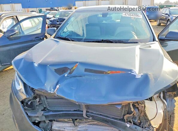 3GNAXHEV5JS626390 2018 CHEVROLET EQUINOX Серый Вид подкапотного пространства