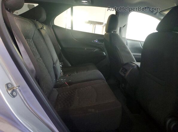 3GNAXJEV9JS644401 2018 CHEVROLET EQUINOX Серебряный Вид задней части салона
