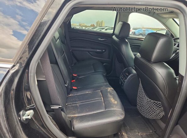 3GYFNBE30GS577599 2016 CADILLAC SRX Черный Вид задней части салона