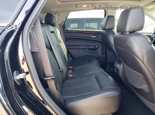 3GYFNEE30GS587292 2016 CADILLAC SRX Black Rear interior view