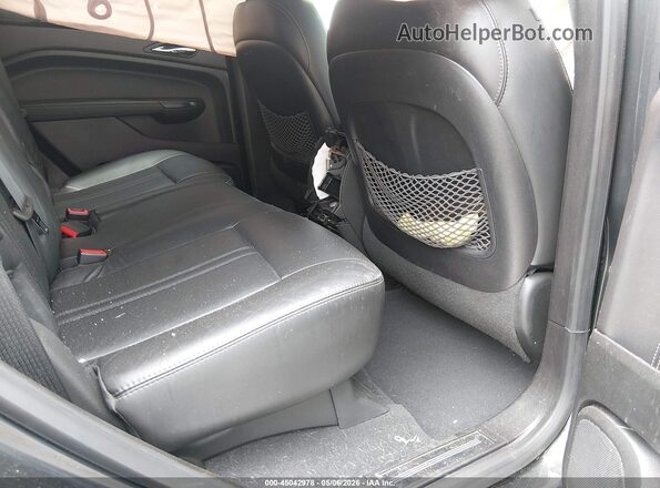 3GYFNEE31GS543804 2016 CADILLAC SRX Gray Widok wnętrza z przodu