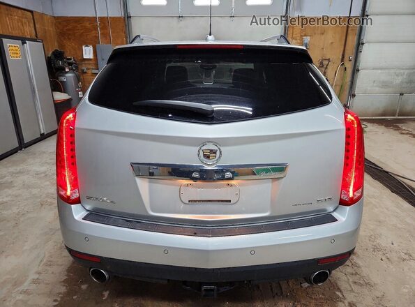 3GYFNEE31GS576057 2016 CADILLAC SRX Silver Widok z tyłu