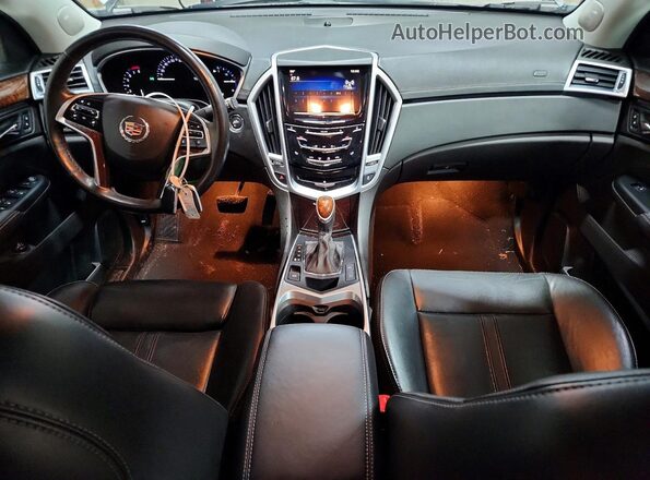 3GYFNEE31GS576057 2016 CADILLAC SRX Silver Widok deski rozdzielczej