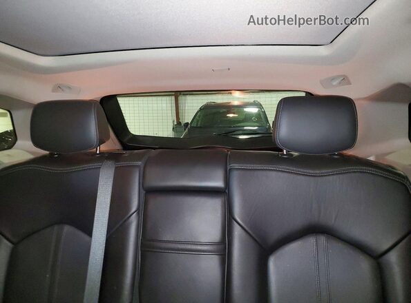 3GYFNFE37GS504527 2016 CADILLAC SRX Gold Rear seats view