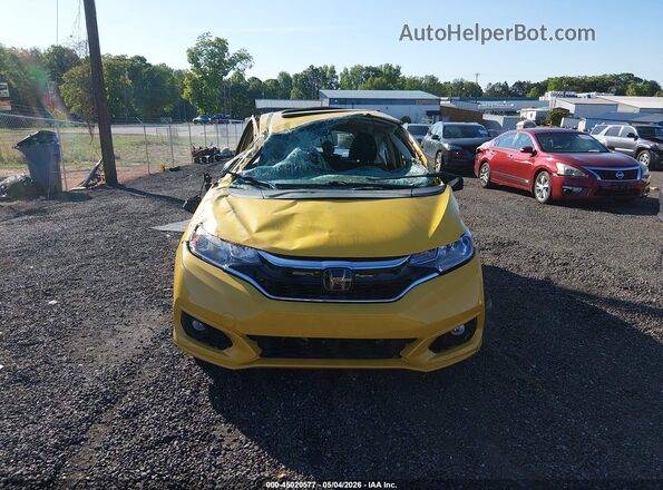 3HGGK5H86JM729376 2018 HONDA FIT Yellow Widok wnętrza z tyłu