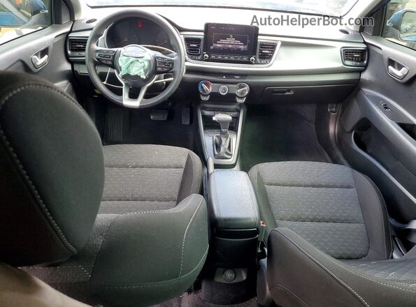 3KPA24AD4PE618706 2023 KIA RIO Blue Dashboard view