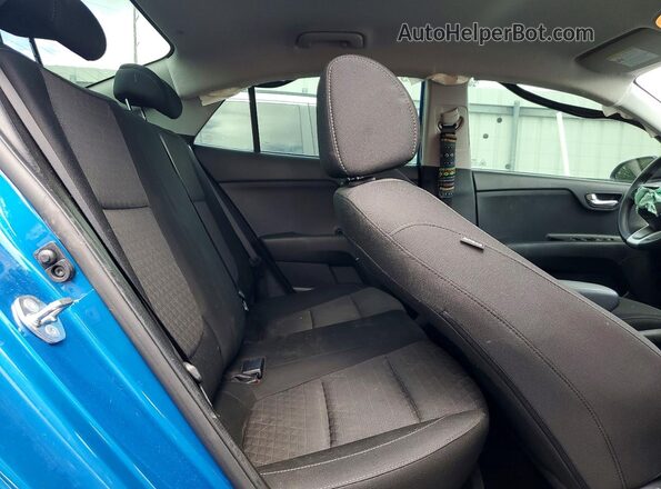 3KPA24AD4PE618706 2023 KIA RIO Blue Rear seats view