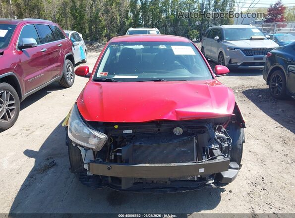 3KPA24AD8LE279085 2020 KIA RIO Красный Вид задней части салона