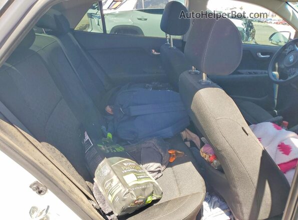 3KPA24AD8LE295836 2020 KIA RIO White Rear seats view