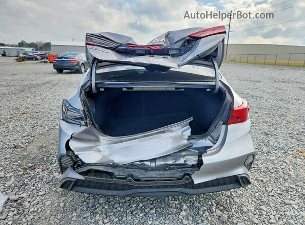 3KPF24AD0RE711098 2024 KIA FORTE Серебряный Вид сзади