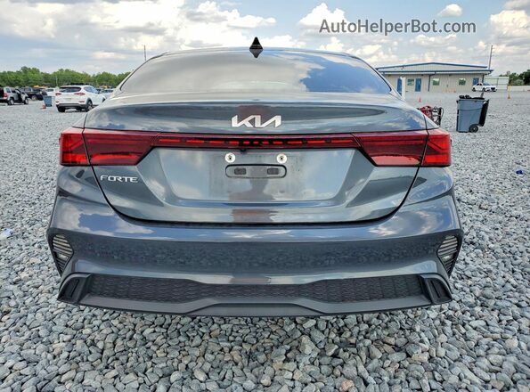 3KPF24AD2PE581208 2023 KIA FORTE Серый Вид сзади