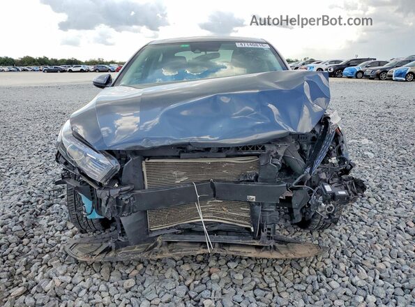 3KPF24AD2PE581208 2023 KIA FORTE Серый Вид спереди