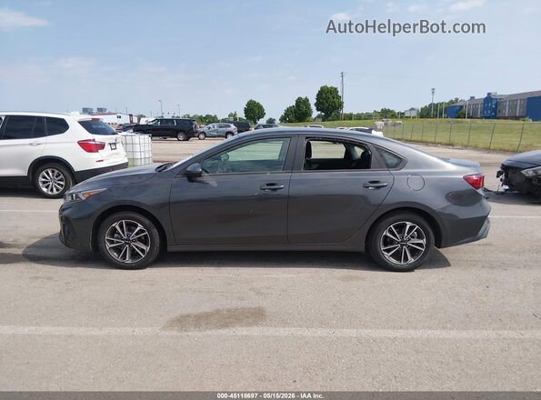 3KPF24AD2RE751750 2024 KIA FORTE Серый Вид задней части салона
