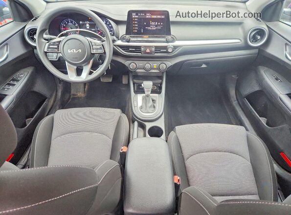 3KPF24AD4PE626875 2023 KIA FORTE Blue Dashboard view