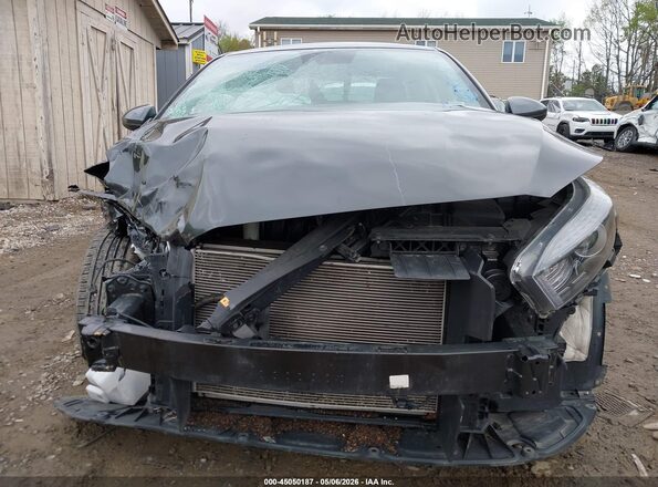 3KPF24AD4RE784877 2024 KIA FORTE Серый Вид задней части салона