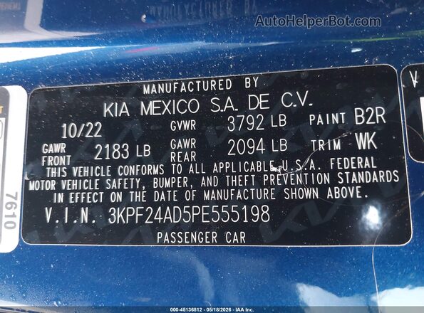 3KPF24AD5PE555198 2023 KIA FORTE Blue Widok komory silnika