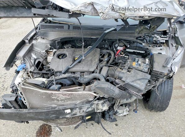 3KPF24AD5PE595989 2023 KIA FORTE Серебряный Вид задней части салона