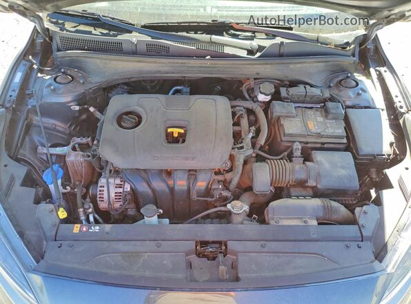 3KPF24AD5RE719987 2024 KIA FORTE Charcoal Vista interior trasera
