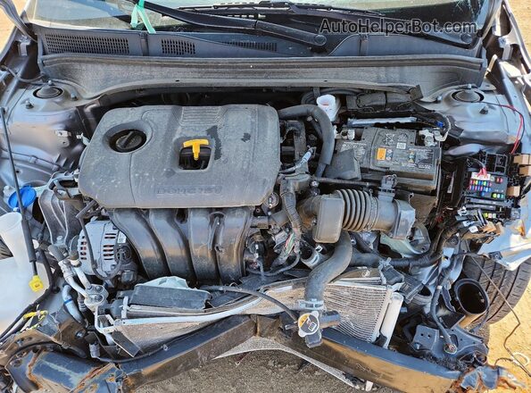 3KPF24AD6RE776635 2024 KIA FORTE Серый Вид задней части салона