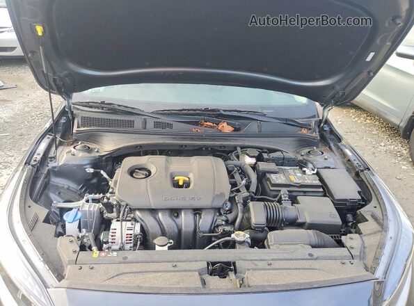 3KPF24AD7RE709929 2024 KIA FORTE Серый Вид задней части салона
