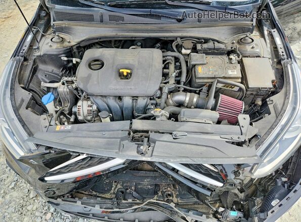 3KPF24AD9LE210766 2020 KIA FORTE Черный Вид задней части салона