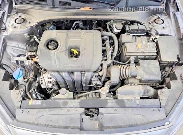 3KPF24AD9RE793574 2024 KIA FORTE Серебряный Вид задней части салона
