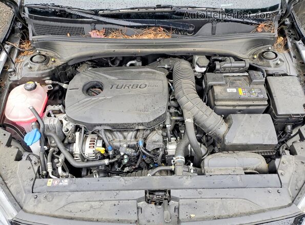 3KPF44AC9PE525588 2023 KIA FORTE Черный Вид задней части салона