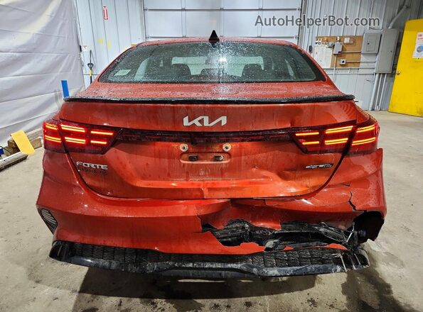 3KPF54AD1NE421194 2022 KIA FORTE Оранжевый Вид сзади