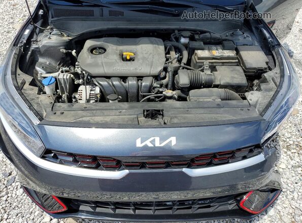 3KPF54AD8PE558457 2023 KIA FORTE Gray Widok wnętrza z tyłu