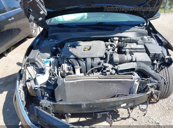 3KPF54AD8RE793864 2024 KIA FORTE Black Widok z tyłu