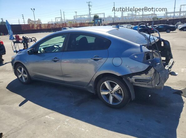 3KPFL4A74JE281829 2018 KIA FORTE Серебряный Задняя левая четверть