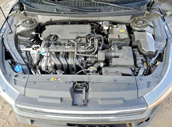 3KPFT4DE4SE200064 2025 KIA K4 Gray Vista interior trasera