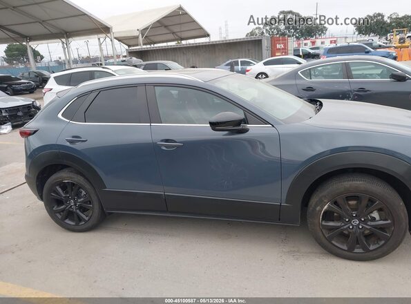 3MVDMBCMXRM660216 2024 MAZDA CX-30 Blue Widok wnętrza z tyłu