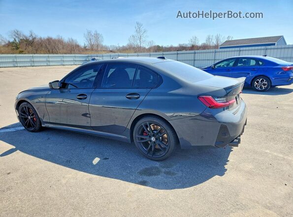 3MW49FF09P8D38379 2023 BMW M3 Gray Trasero izquierdo