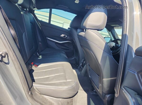 3MW49FF09P8D38379 2023 BMW M3 Gray Vista de los asientos traseros
