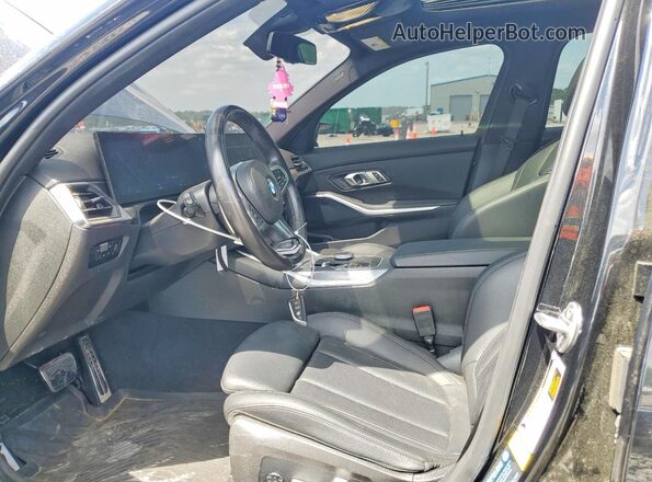 3MW49FS03P8D69343 2023 BMW M3 Black წინა სალონის ხედი