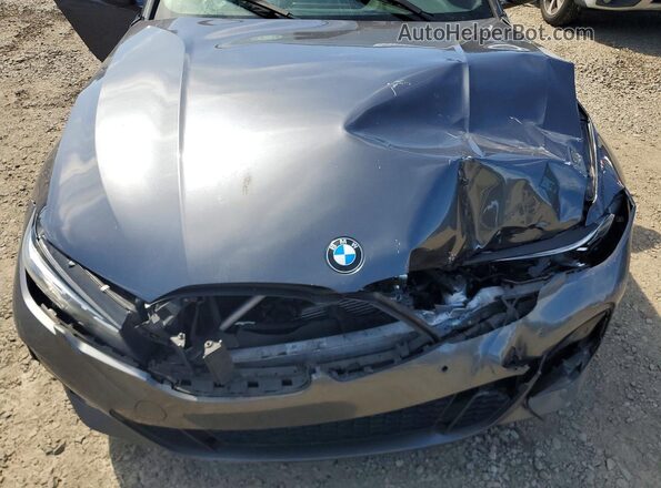 3MW5U7J0XN8C34643 2022 BMW M3 Серый Вид задней части салона