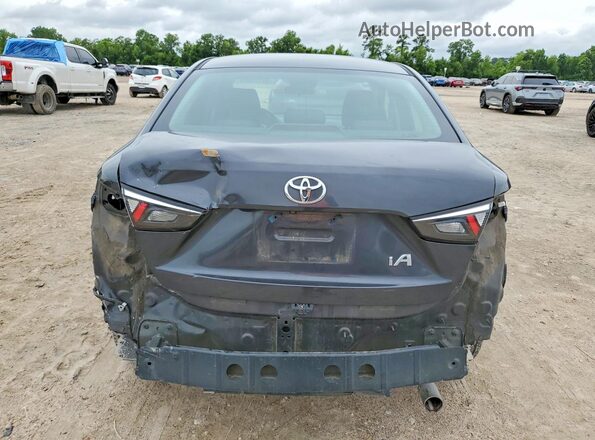 3MYDLBYV3HY186236 2017 TOYOTA YARIS Gray Vista trasera