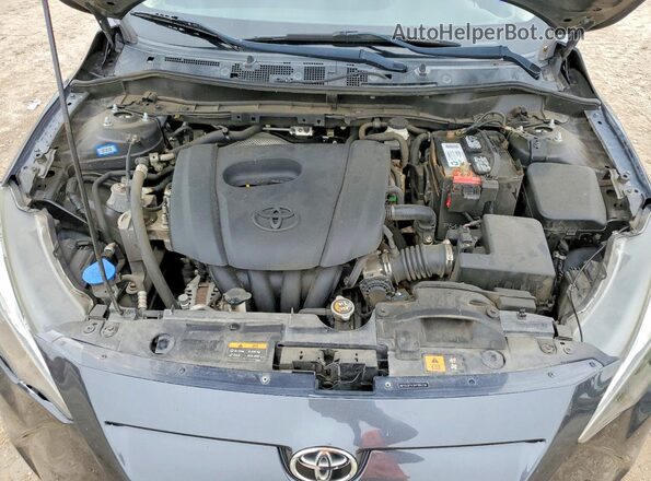 3MYDLBYV3HY186236 2017 TOYOTA YARIS Gray Vista interior trasera