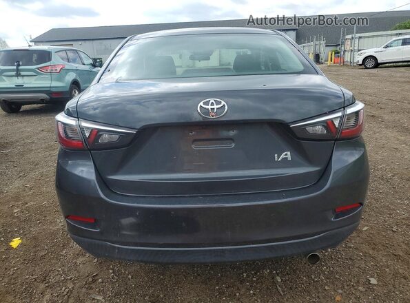 3MYDLBYV4HY174242 2017 TOYOTA YARIS Gray Rear view