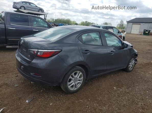 3MYDLBYV4HY174242 2017 TOYOTA YARIS Gray Rear right