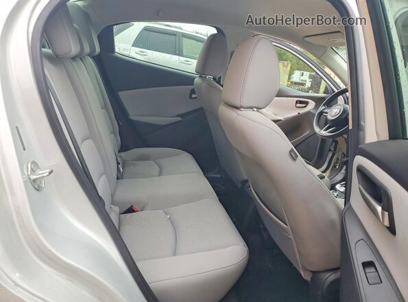 3MYDLBYV5KY512965 2019 TOYOTA YARIS Silver Rear seats view