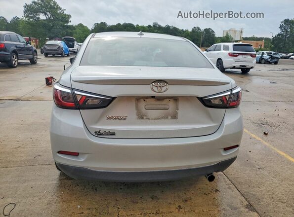 3MYDLBYV5KY512965 2019 TOYOTA YARIS Silver Rear view