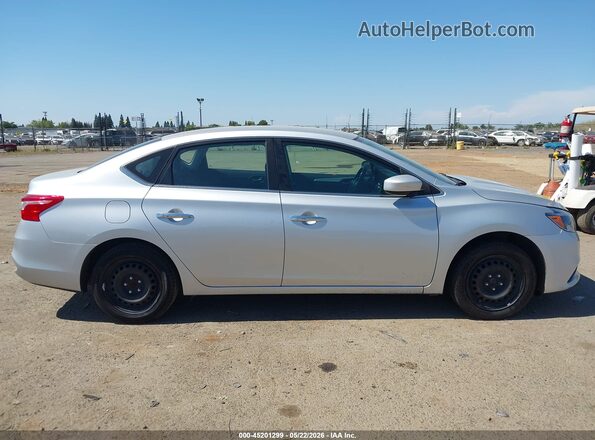 3N1AB7AP0KY383369 2019 NISSAN SENTRA Серебряный Вид задней части салона